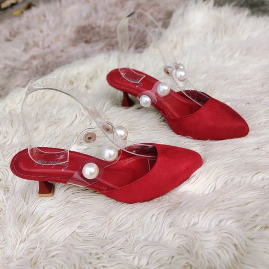 Mules embalished with cut pearl